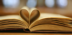 Book pages folded to form a heart